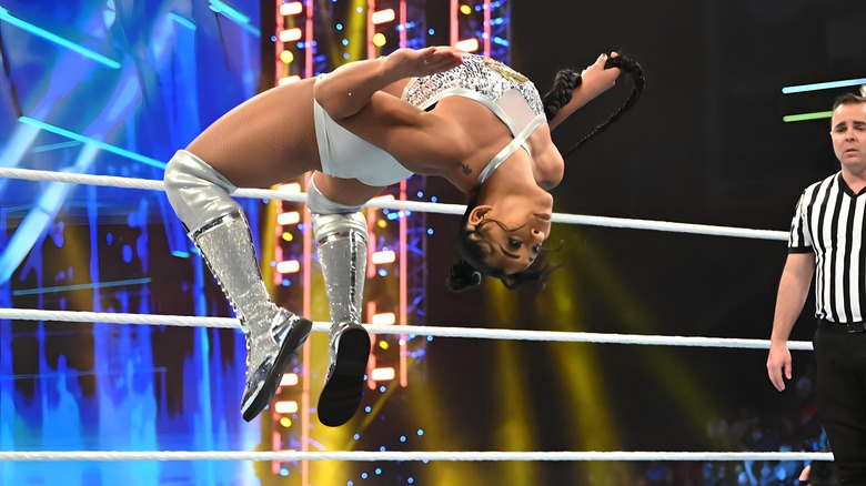 Bianca Belair does a backflip