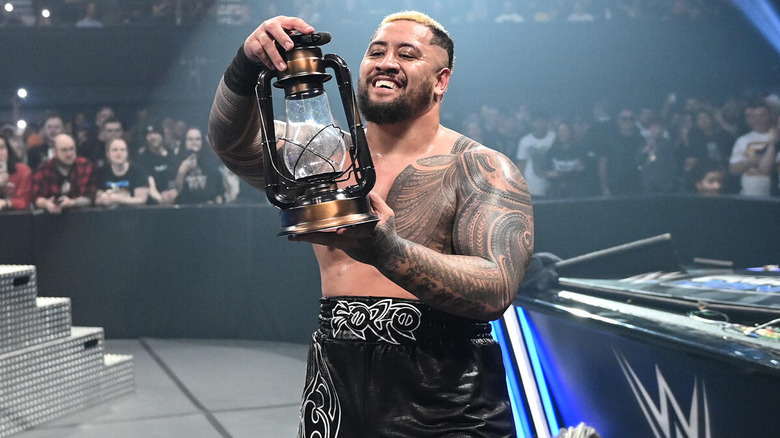 Solo Sikoa holding Bray Wyatt's lantern on "WWE SmackDown"