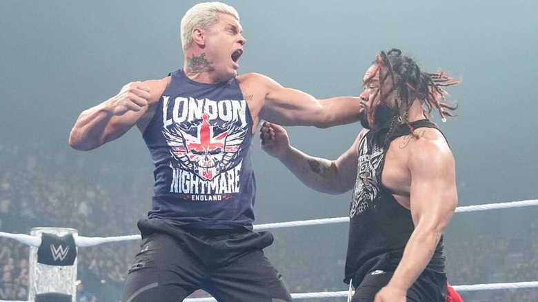 Cody Rhodes aims to hit a punch on Jacob Fatu in the middle of the ring during an episode of "WWE SmackDown."