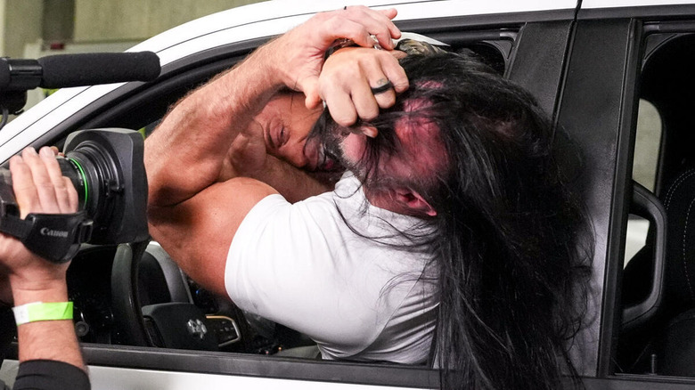 Undisputed WWE Champion Cody Rhodes attacks Drew McIntyre in his car on "WWE SmackDown"