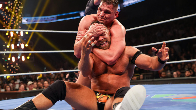 GUNTHER with a sleeper hold on LA Knight on "WWE SmackDown"