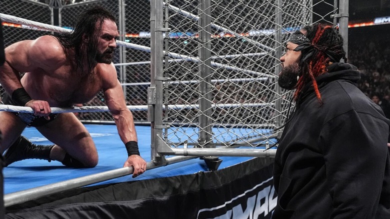 Drew McIntyre stares at Jacob Fatu from inside the cage on "WWE SmackDown"