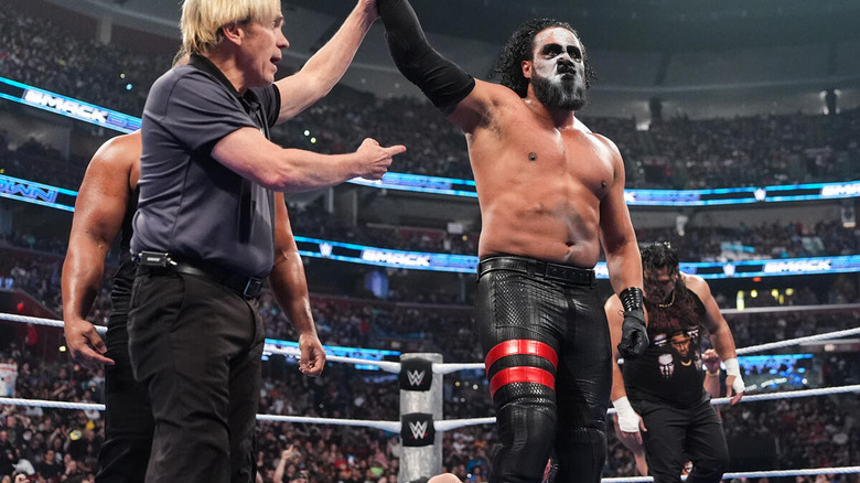 Referee raising Tama Tonga's arm on "WWE SmackDown"