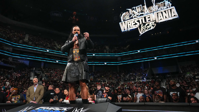 Drew McIntyre speaks into a microphone on "WWE SmackDown"