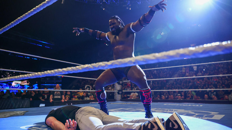 Oba Femi poses above Johnny Gargano on "WWE SmackDown"