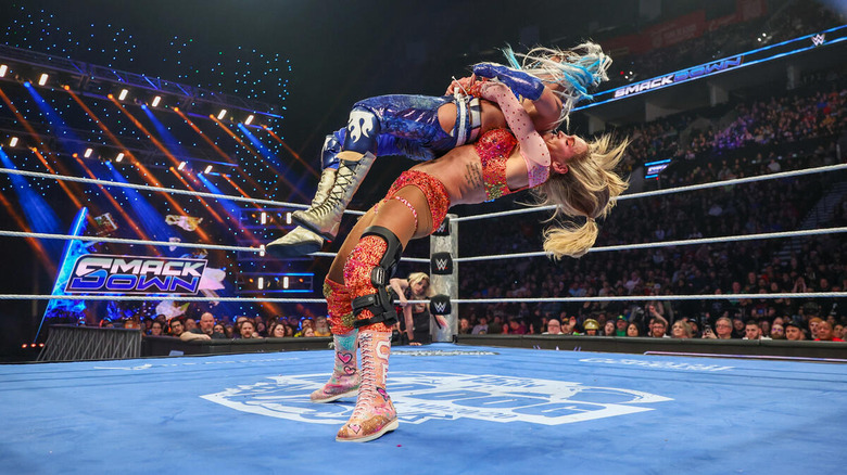 Charlotte Flair suplexes Giulia on "WWE SmackDown"