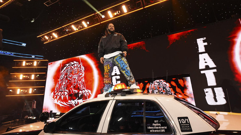 Jacob Fatu cuts a promo on a cop car