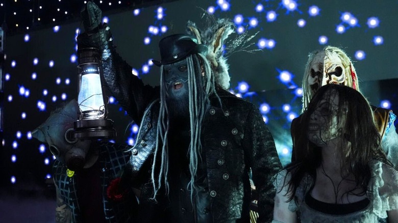 The Wyatt Sicks, led by Uncle Howdy with his lantern, make their way down to the ring for a match on "WWE SmackDown."