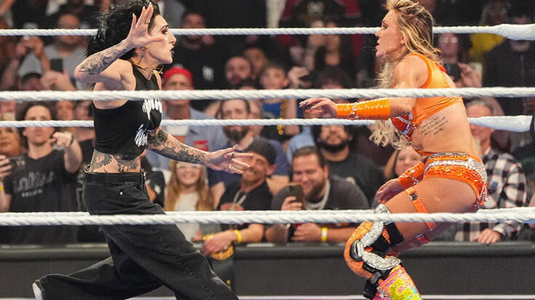 Rhea Ripley and Charlotte Flair nearly run into each other on "WWE SmackDown"