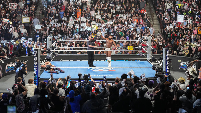 Trick Williams celebrates in the ring in his hometown on "WWE SmackDown"