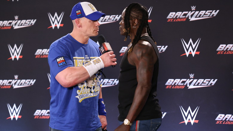 John Cena addresses R-Truth during the WWE Backlash Press Conference at Enterprise Center on May 10, 2025 in St Louis, Missouri