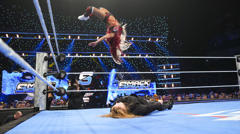 Vega landing a moonsault on Niven