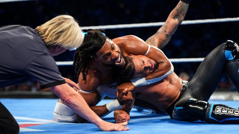 Trick Williams with a headlock on Carmelo Hayes on "WWE SmackDown"