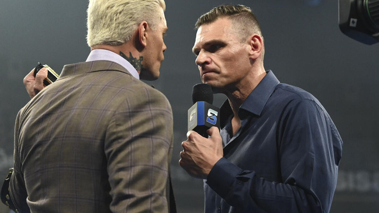 GUNTHER stares down Cody Rhodes with a microphone on "WWE SmackDown"