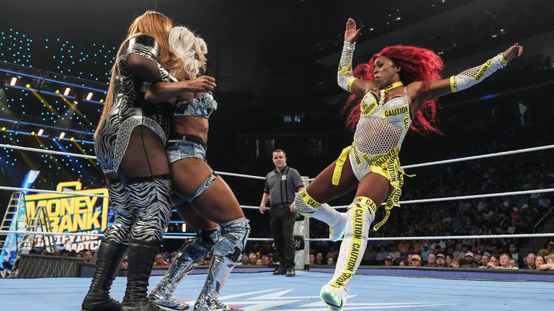 Naomi delivers a kick