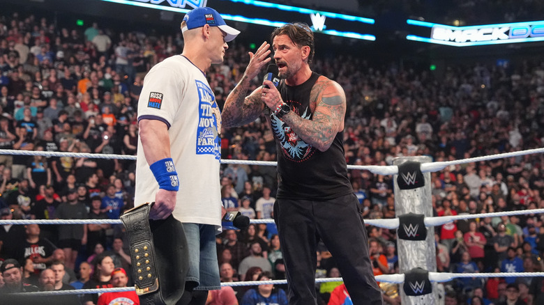 CM Punk face to face with John Cena in the ring on "WWE SmackDown"