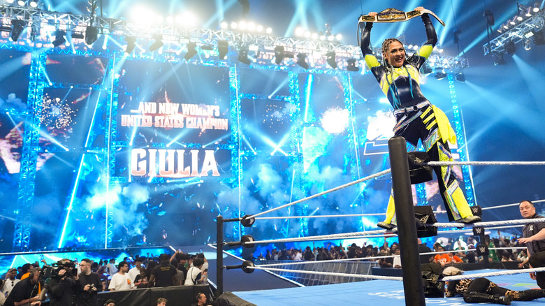 Giulia holding up the Women's United States Championship belt