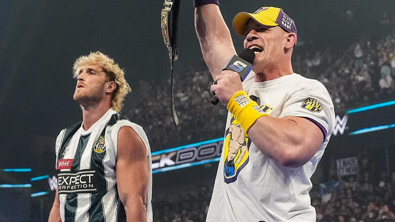 John Cena on the mic alongside Logan Paul on "WWE SmackDown"