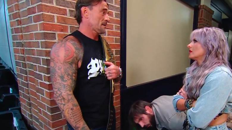 CM Punk confronts Candice LeRae and Johnny Gargano on "WWE SmackDown"