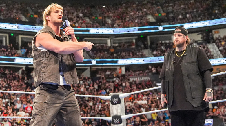 Logan Paul points at Jelly Roll while speaking into a mic on "WWE SmackDown"