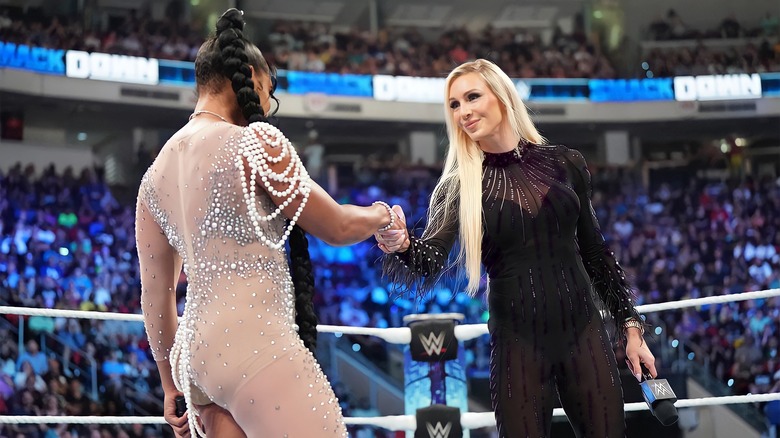Bianca Belair and Charlotte Flair shake hands