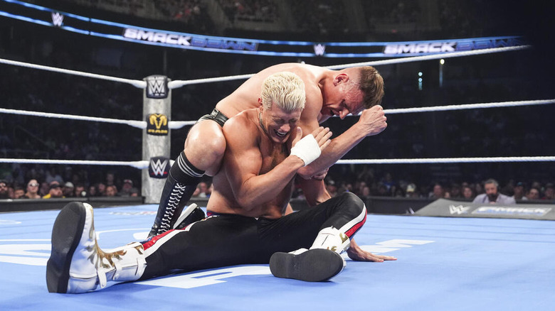 GUNTHER grapples with Cody Rhodes in the ring on "WWE SmackDown"