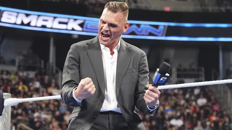 GUNTHER pumps his fists joyously on "WWE SmackDown"