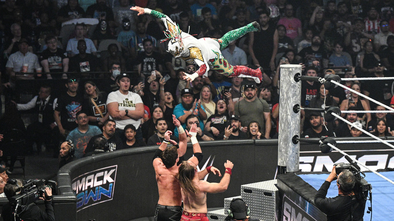 Rey Fenix soars over Alex Shelley, Chris Sabin, and Nathan Frazer on an episode of "WWE SmackDown."