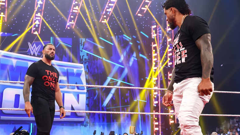 Jey Uso staring down Roman Reigns