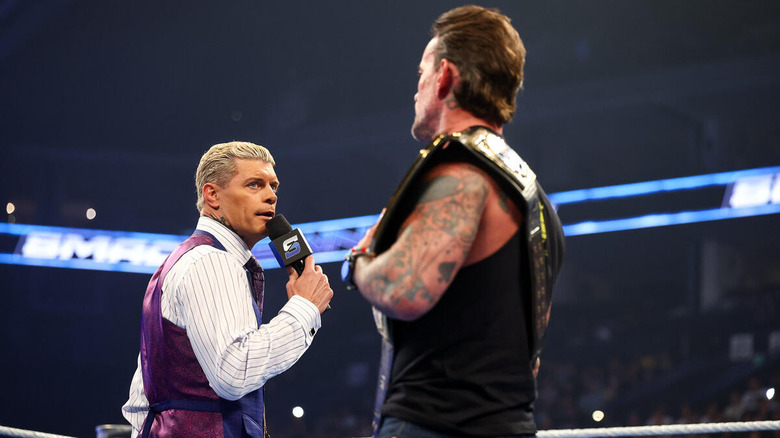 Cody Rhodes talking on the microphone to CM Punk on "WWE SmackDown"