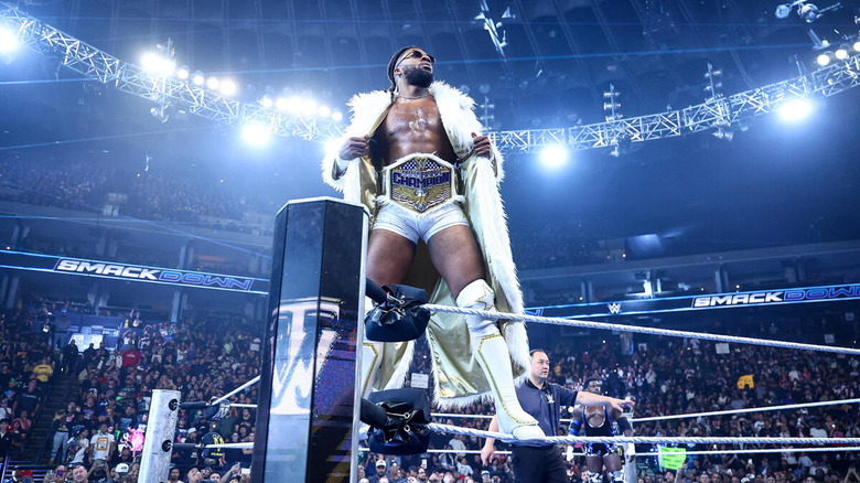 Trick Williams stands in the ring during his entrance on "WWE SmackDown"
