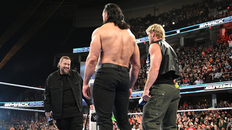 Jelly Roll is happy to see Logan Paul has backup in the form of Drew McIntyre during SmackDown at Rocket Mortgage Fieldhouse on July 25, 2025 in Cleveland, Ohio.