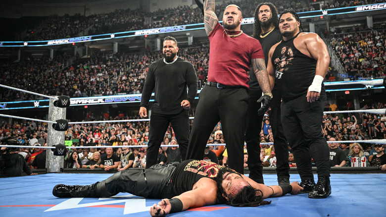 MFT standing over Fatu