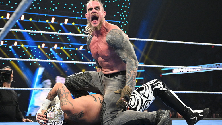 Dexter Lumis straddles Rey Fenix on "WWE SmackDown"
