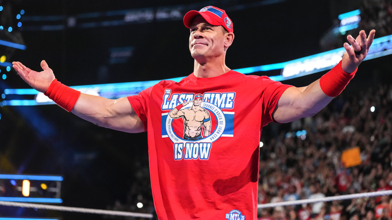 John Cena in the ring with arms wide on "WWE SmackDown"
