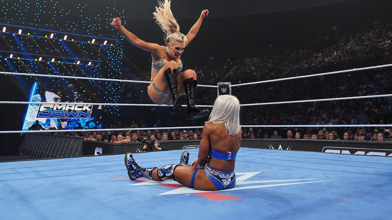 Tiffany Stratton delivers a dropkick to a seated Jade Cargill on "WWE SmackDown"
