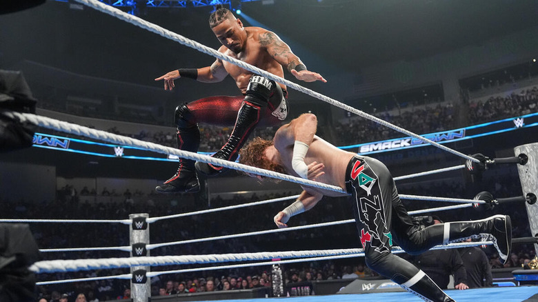 Carmelo Hayes drops a leg on Sami Zayn while he lies across the second rope on "WWE SmackDown"