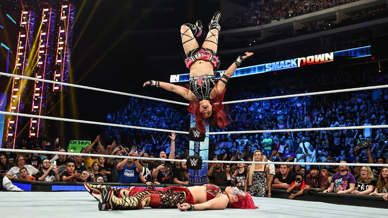 IYO SKY moonsaulting onto ASUKA