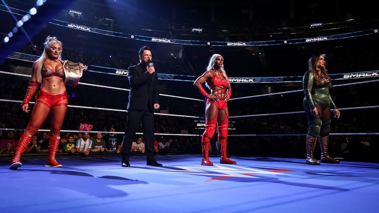 Tiffany Stratton stands in the ring with Jade Cargill and Nia Jax on "WWE SmackDown"