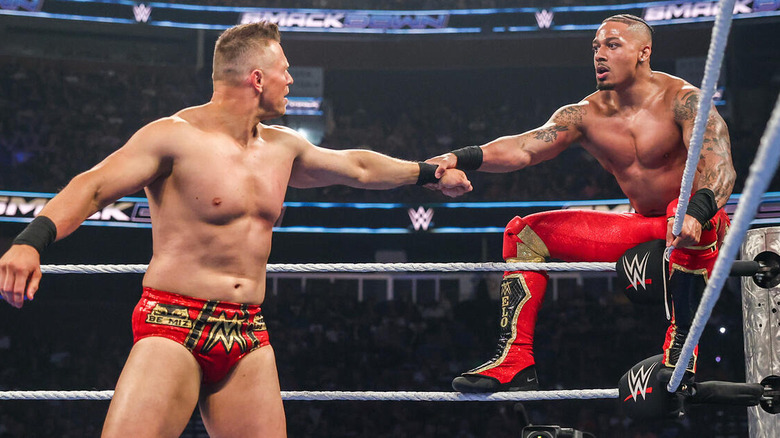 Carmelo Hayes grasps The Miz by the wrist at "WWE SmackDown"