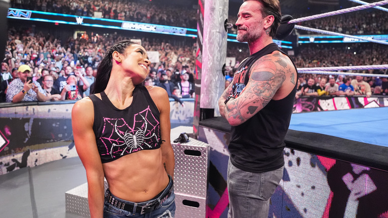 AJ Lee stands with CM Punk on "WWE SmackDown"
