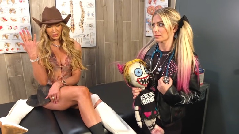 Charlotte Flair and Alexa Bliss backstage at "WWE SmackDown"