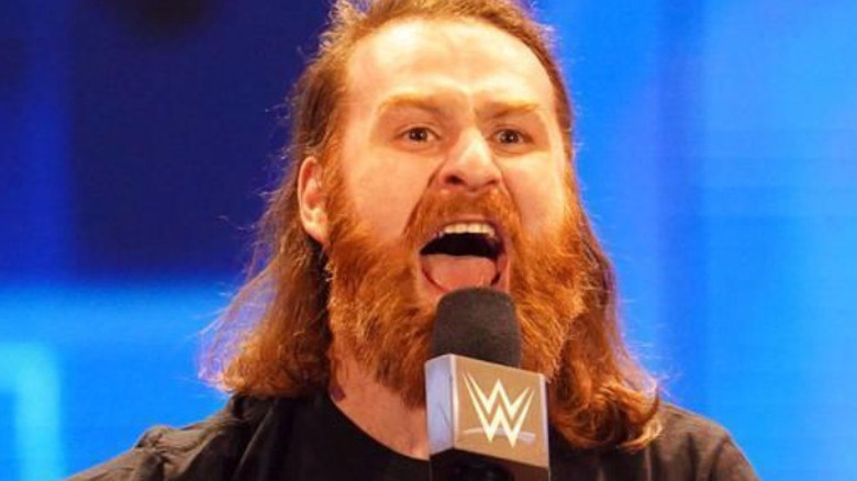 Sami Zayn yelling microphone