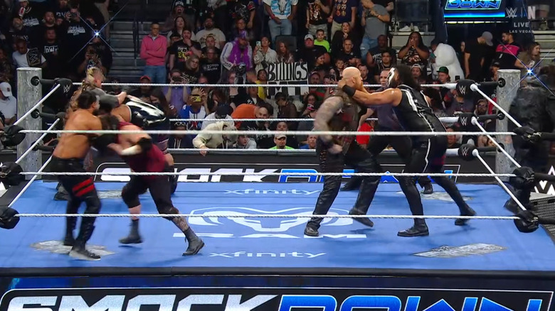 All eight men in the ring