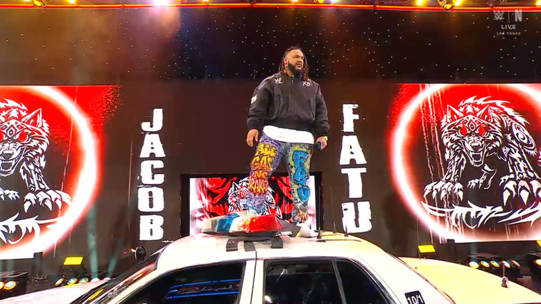 Fatu on top of the police car