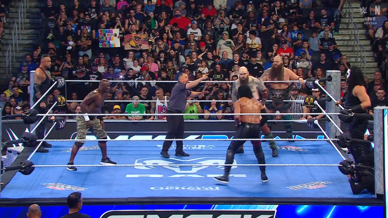 All six men in and around the ring