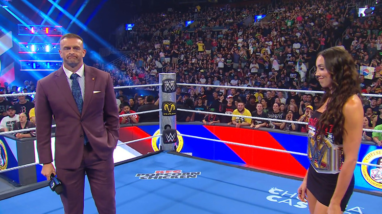 Aldis and Green inside the ring