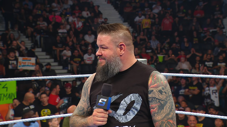 Owens talking in the ring