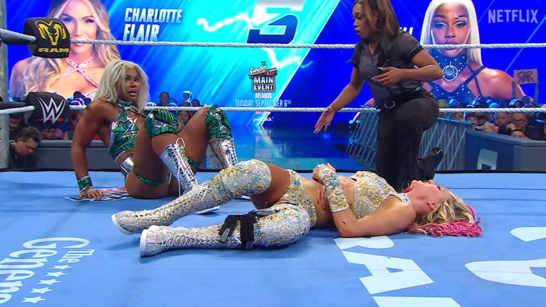 Cargill and Flair down inside the ring