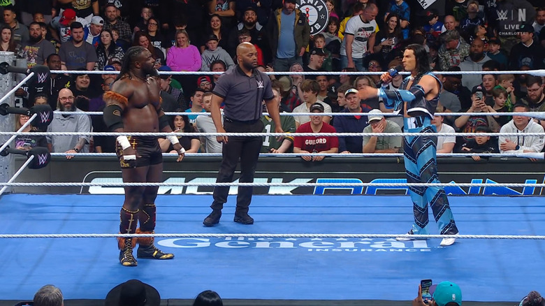 Femi and Wilson staring one another down in the ring